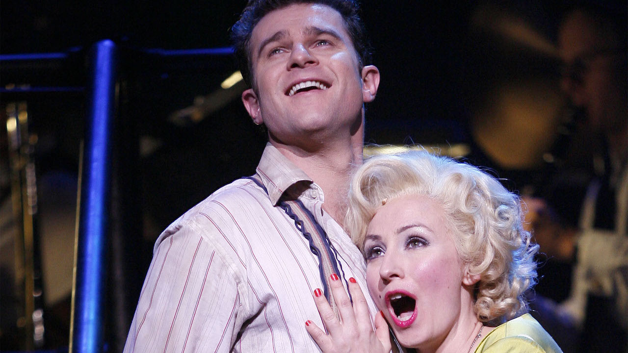 Bobby and Hope sining in the Sydney Theatre Company production of Urinetown