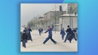 Screenshot of colourised 1897 snowball fight footage