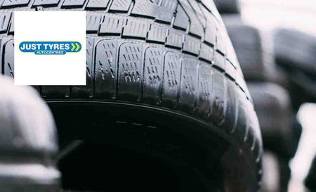 Just Tyres logo placed over an image of tyres