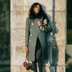 An image of @emmanuellek_ wearing one of the best French fashion brands.