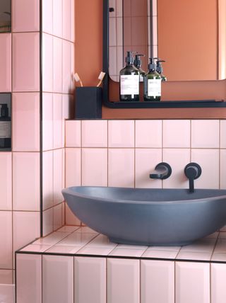 Pink tiles with a red grout line