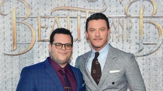 osh Gad and Luke Evans arrive at the world premiere of Disney's new live-action "Beauty and the Beast"