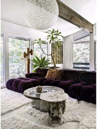 A purple colored sofa