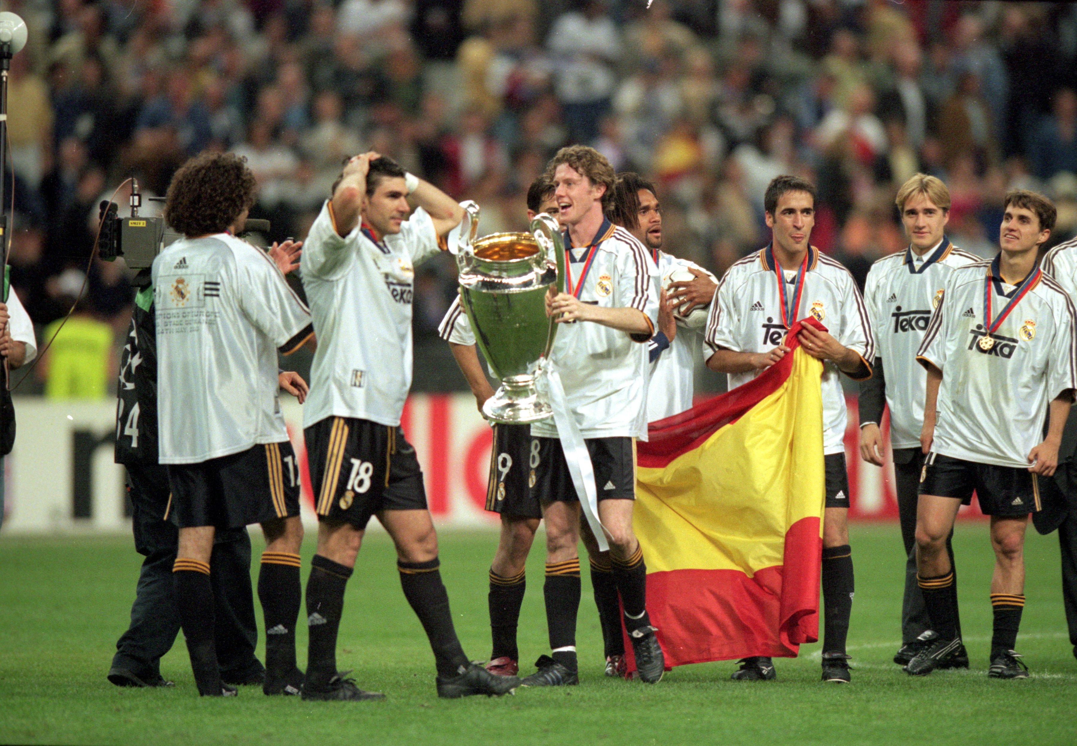 Steve McManaman celebrates with the Champions league trophy after Real Madrid's win over Valencia in the final in May 2000.