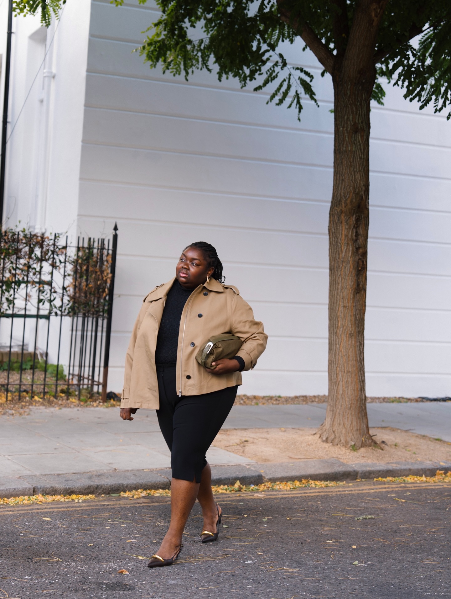 An image of @abimarvel wearing capri leggings with pierced heels, one of the biggest trends to wear with leggings in 2026.