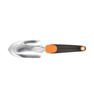 A trowel with a silver head and a black and orange handle
