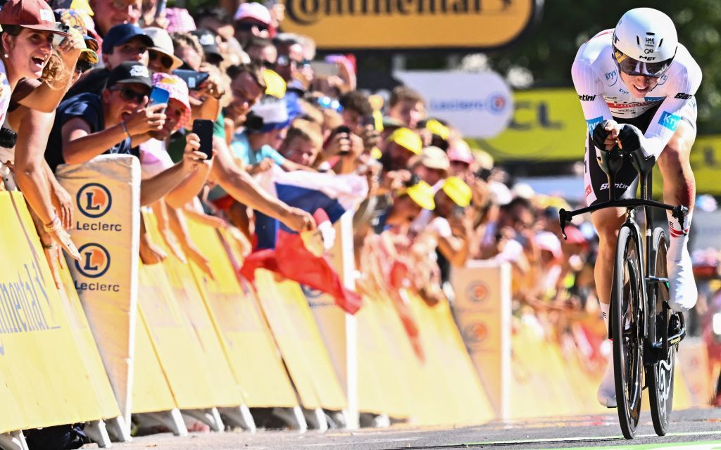 UAE Team Emirates teams Slovenian rider Tadej Pogacar wearing the best young riders white jersey cycles to the finish line during the 20th stage of the 109th edition of the Tour de France cycling race 407 km individual time trial between LacapelleMarival and Rocamadour in southwestern France on July 23 2022 Photo by AnneChristine POUJOULAT AFP Photo by ANNECHRISTINE POUJOULATAFP via Getty Images