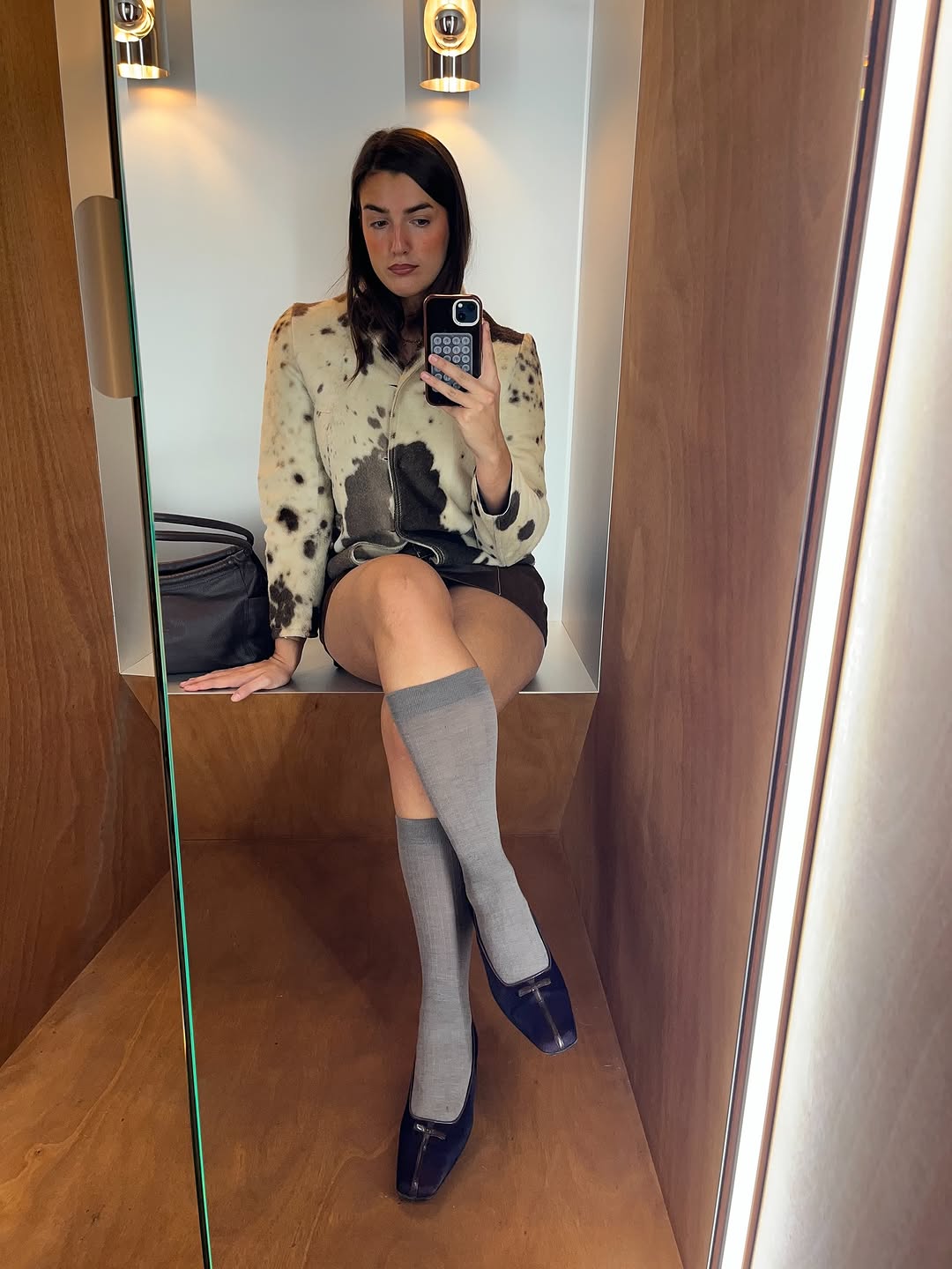woman wearing knee high sock outfit