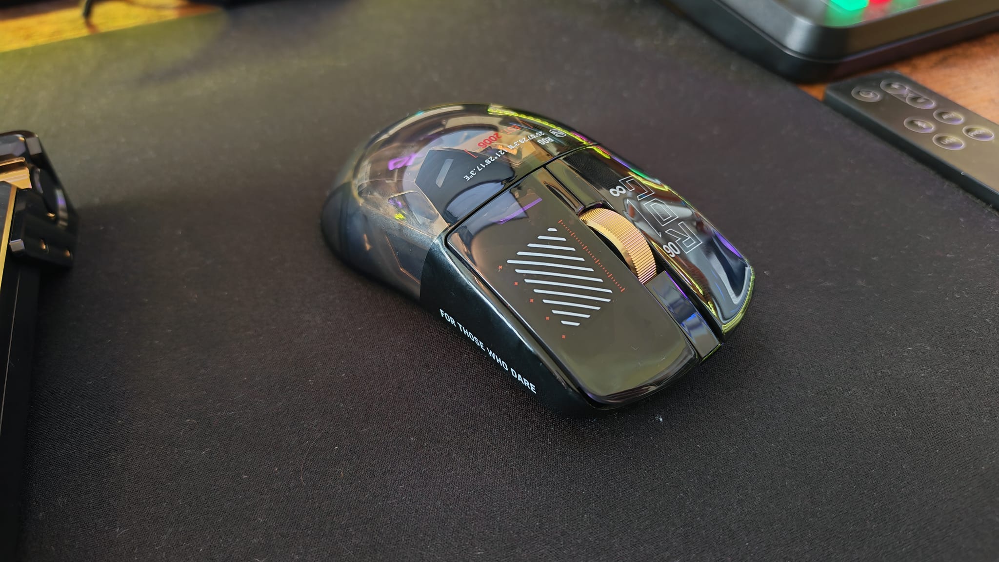 An Asus ROG Harpe II Extreme Edition 20 mouse facing the camera