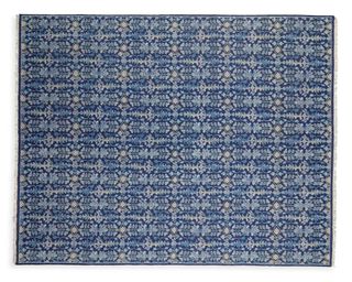 A patterned blue outdoor rug from Serena & Lily