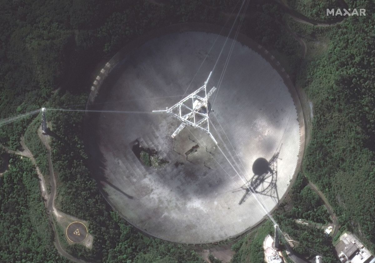 An up-close satellite view of the Arecibo radio telescope's dish.