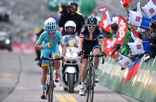 Miguel Angel Lopez and Geraint Thomas cross the line together