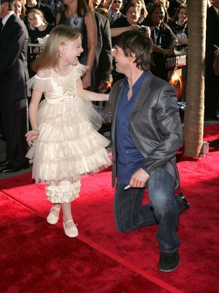Dakota Fanning and Tom Cruise