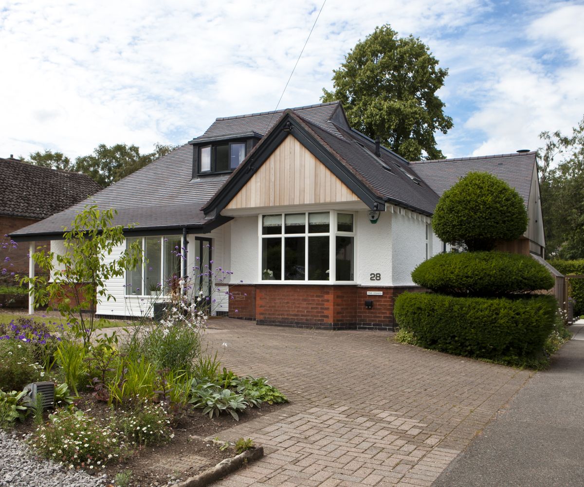 The original dormer bungalow has been extensively remodelled and enlarged, with a new semi-open plan living/dining/kitchen space running from the front to the back of the ground floor.