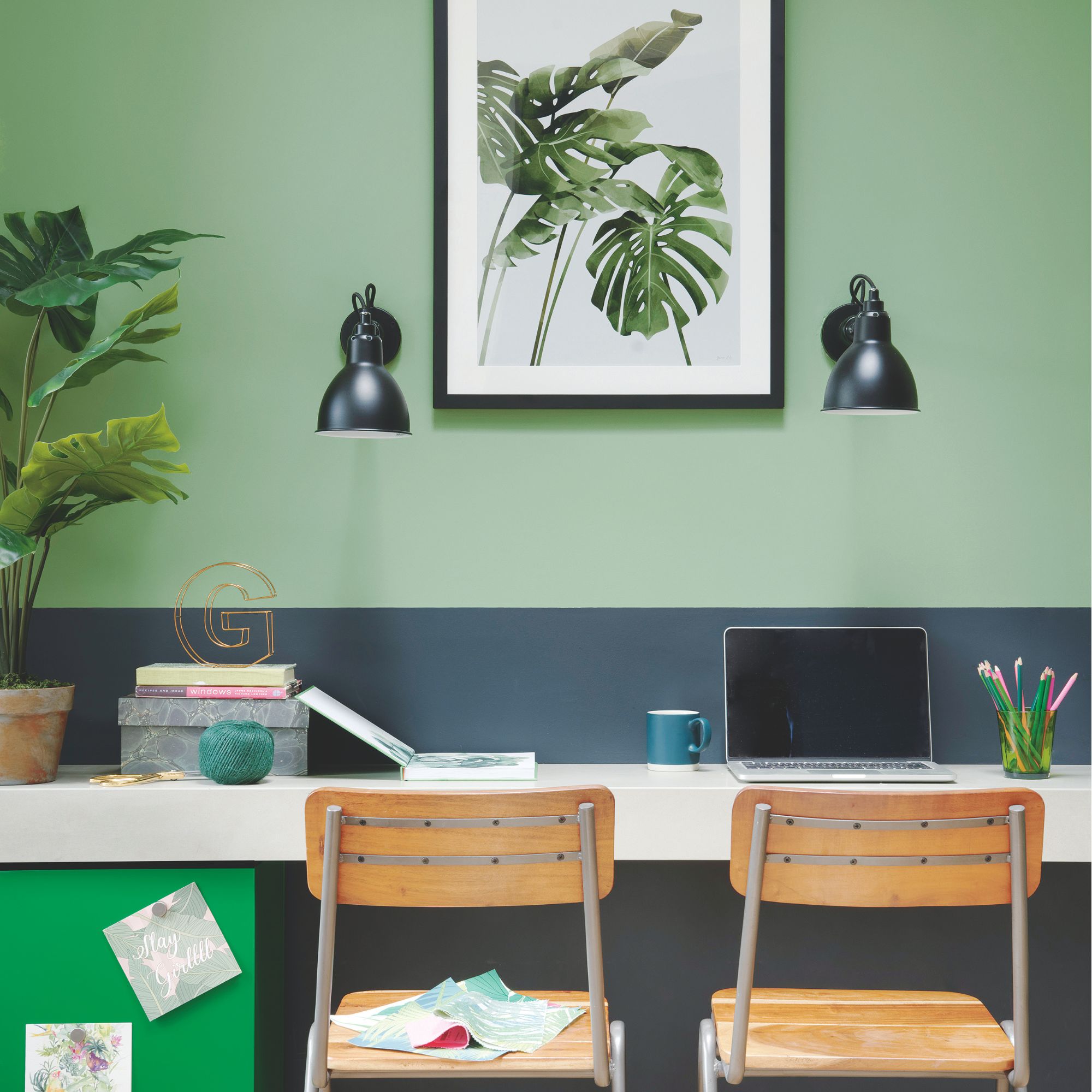 A green office space with wooden accents and natural motifs
