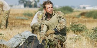 Max Thieriot as Clay Spenser in SEAL Team.