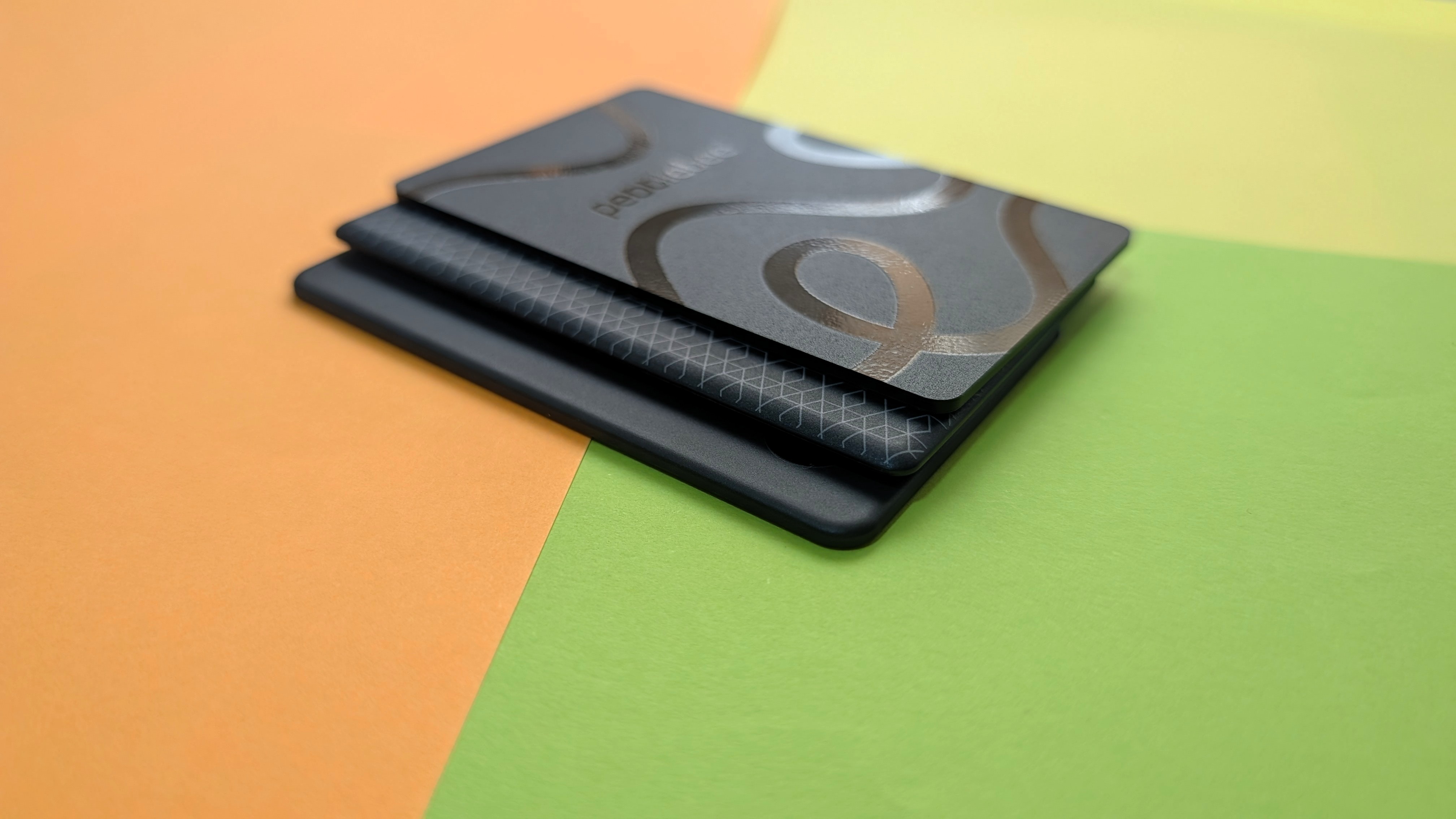 UAG Metropolis Tracker Card, Chipolo Card 2025, and Pebblebee Card 5 Bluetooth trackers