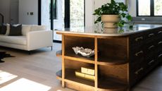 a kitchen island with built in storage