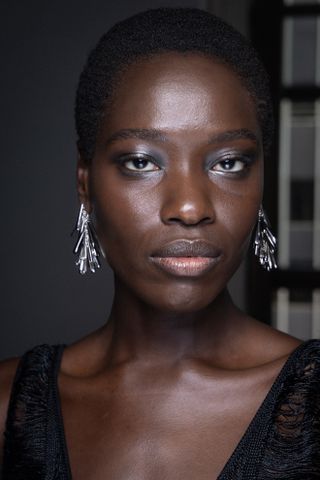 A model at Altuzarra wearing silver eyes, a key Fashion Week Autumn/Winter 25 beauty look