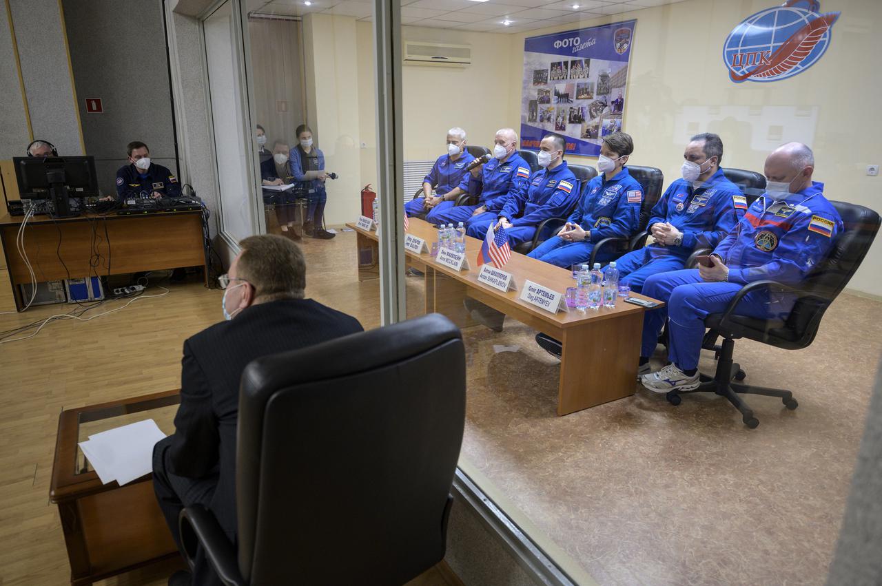 All astronauts quarantine before launch to reduce the odds of a virus affecting life in orbit. NASA astronaut Mark Vande Hei and Roscosmos cosmonauts Oleg Novitskiy and Pyotr Dubrov, along with their backup crew, are seen behind a partition in before their launch from Baikonur Cosmodrome in Kazakhstan in April.