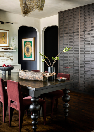 A dining room with storage cabinets