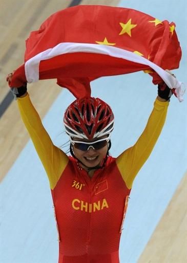 Xin Liu (People's Republic of China) celebrates her victory in the points race.