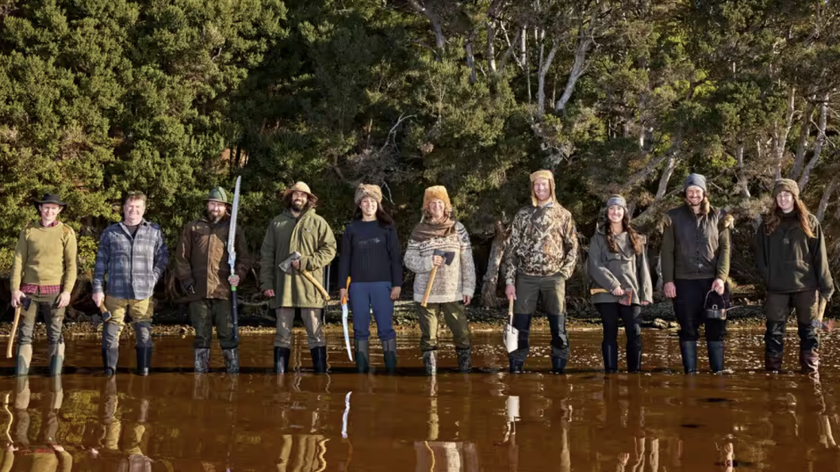 The cast of Alone Australia season 3, standing in a knee-high body of water