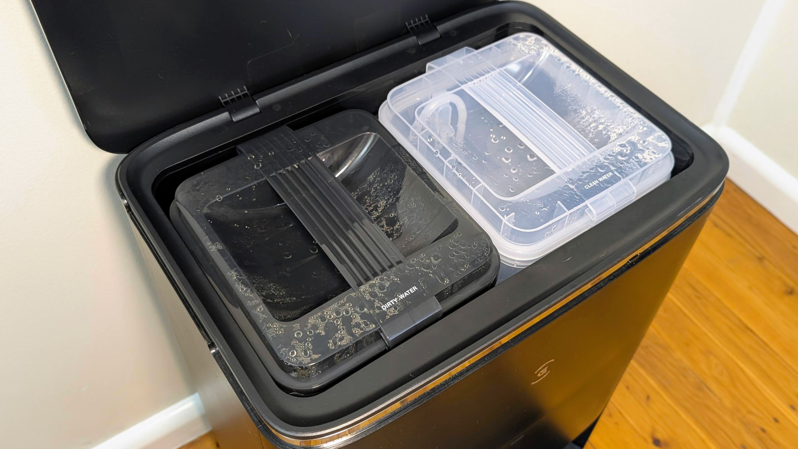 Ecovacs X5 Pro Omni fresh and dirty water containers in base station