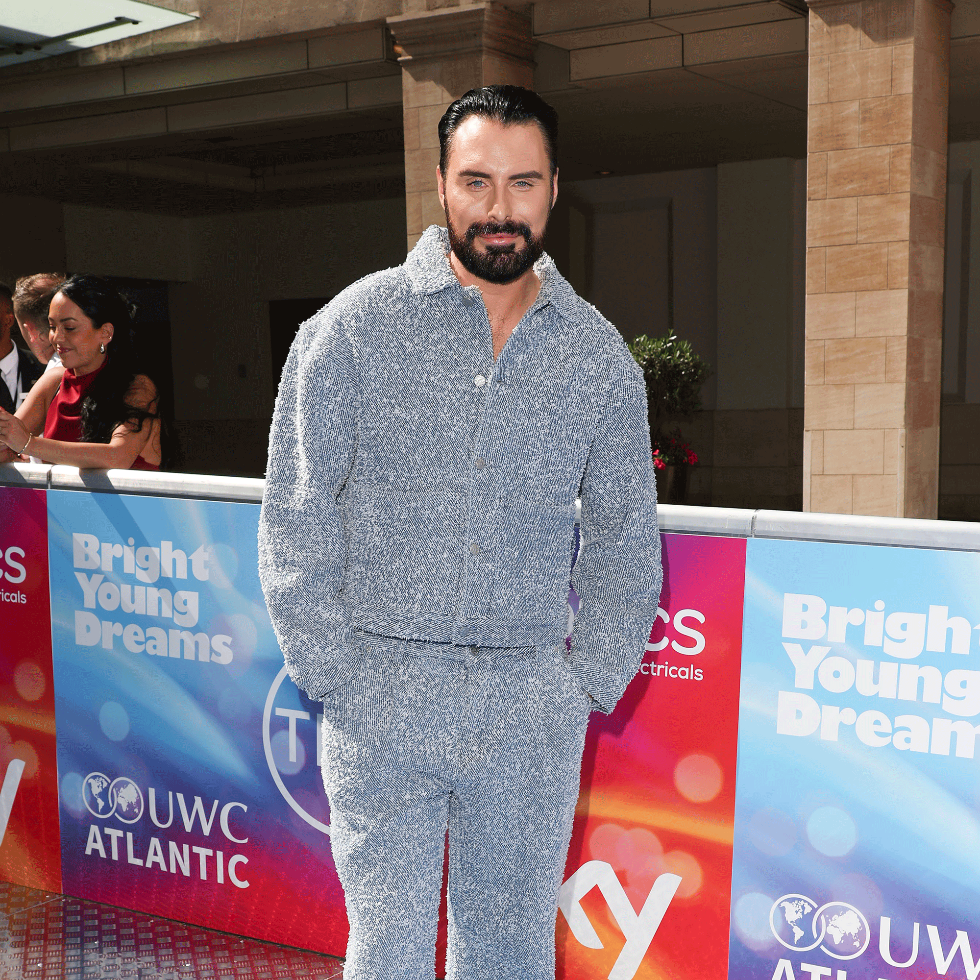 Rylan in a blue outfit 