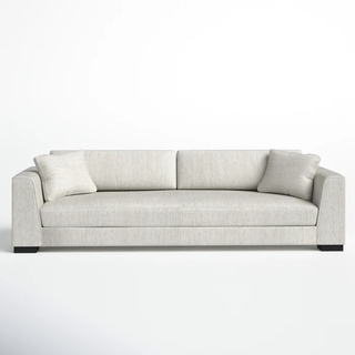 white single-cushion sofa