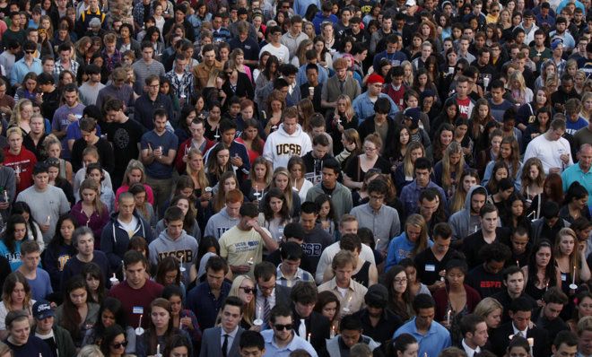 Students gather on the UC Santa Barbara campus for a candlelight vigil on May 24.