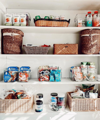 A well-organized pantry utilizing woven baskets