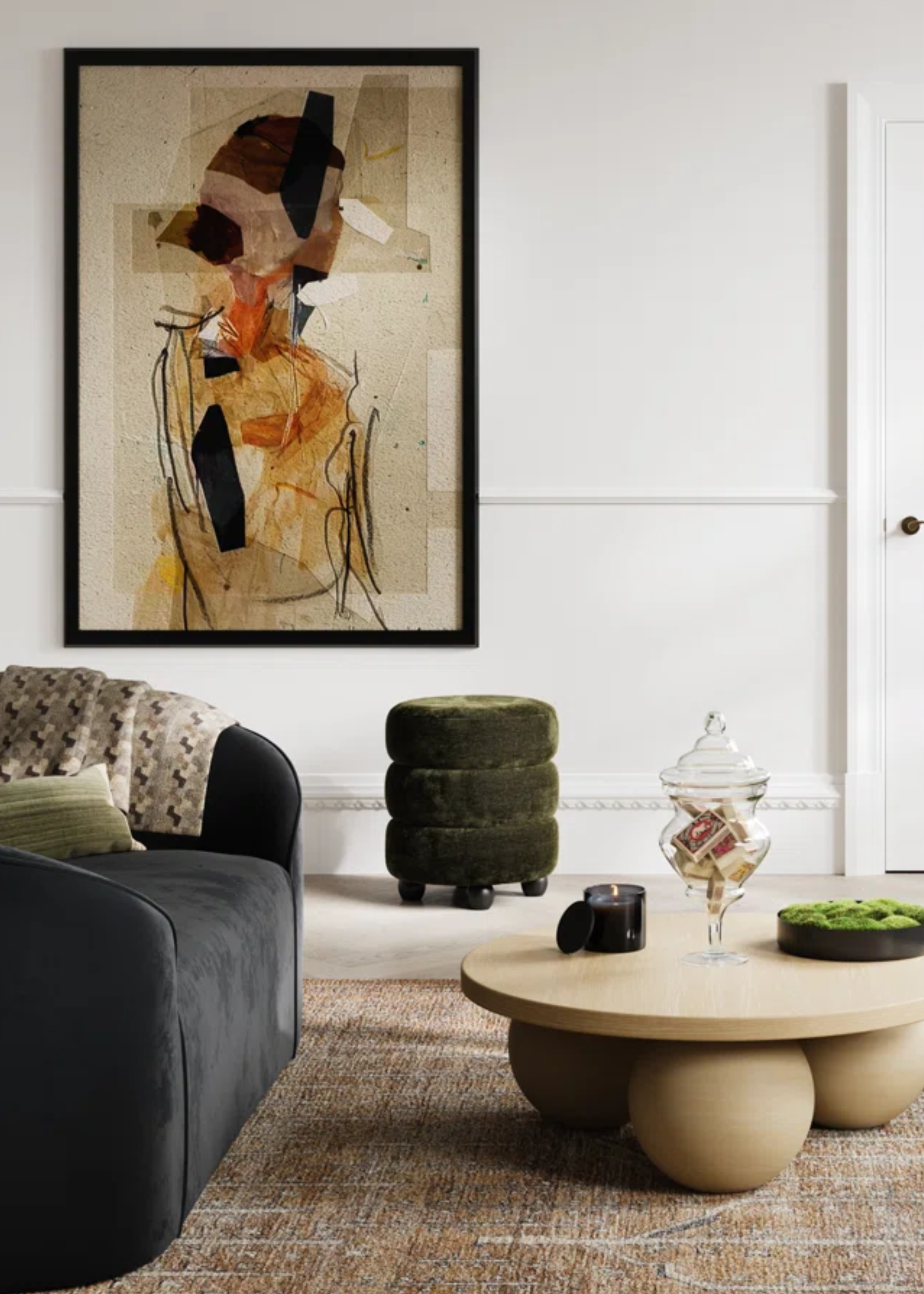 A living room with a bobbin coffee table, a bobbin-detailed ottomman and a large framed painting