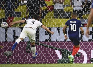 France’s Kylian Mbappe (right) on as Germany’s Mats Hummels scores an own goal