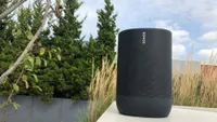 The Sonos Move being tested in a backyard