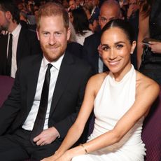 Meghan Markle and Prince Harry at the 2024 Espy awards in a white dress 