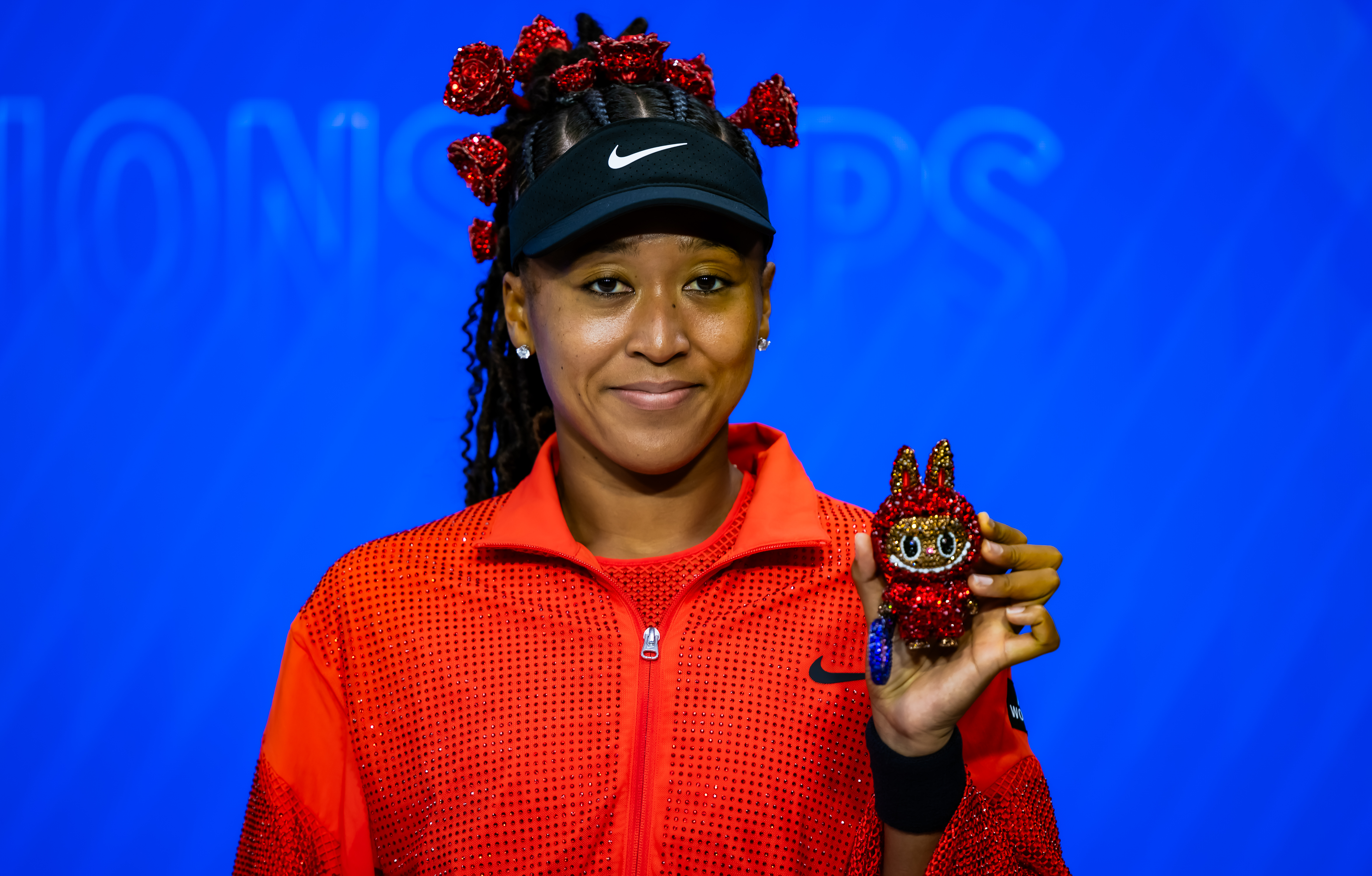 Naomi Osaka competed at the 2025 US Open in an all-red Nike outfit