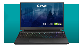 AORUS LAPTOP in front of a green backdrop. 