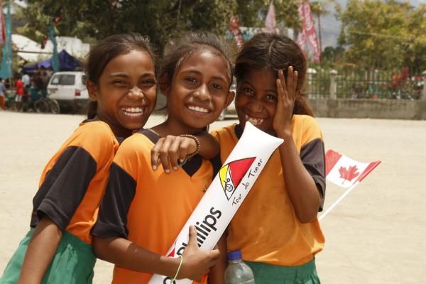 Young cycling fans in Timor