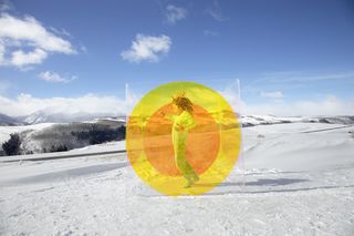 Yellow image of girl jumping in the snow