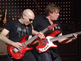 Hamm (right) on stage with Satch in 2008.