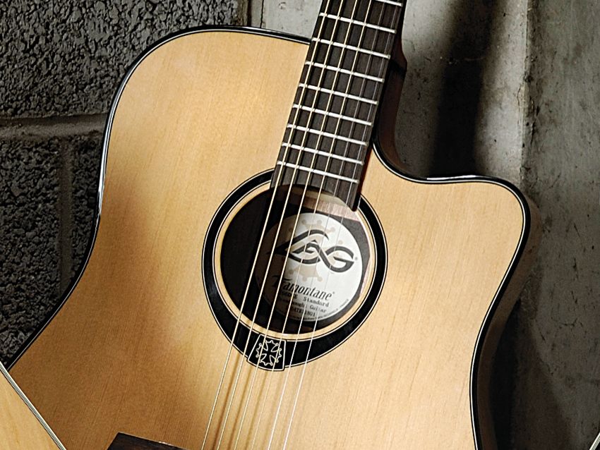 The natural High Gloss finish with Honey Mahogany sides, back and neck.
