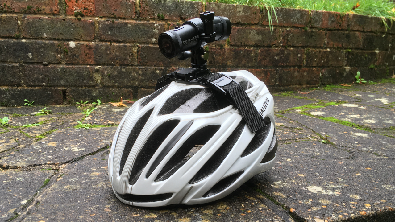 Image shows the Techalogic DC-1 mounted on a bike helmet