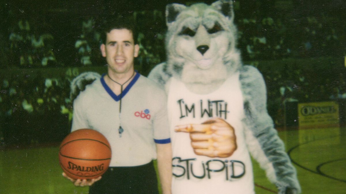 Old photo of Tim Donaghy with a wolf mascot from Netflix&#039;s Operation Flagrant Foul