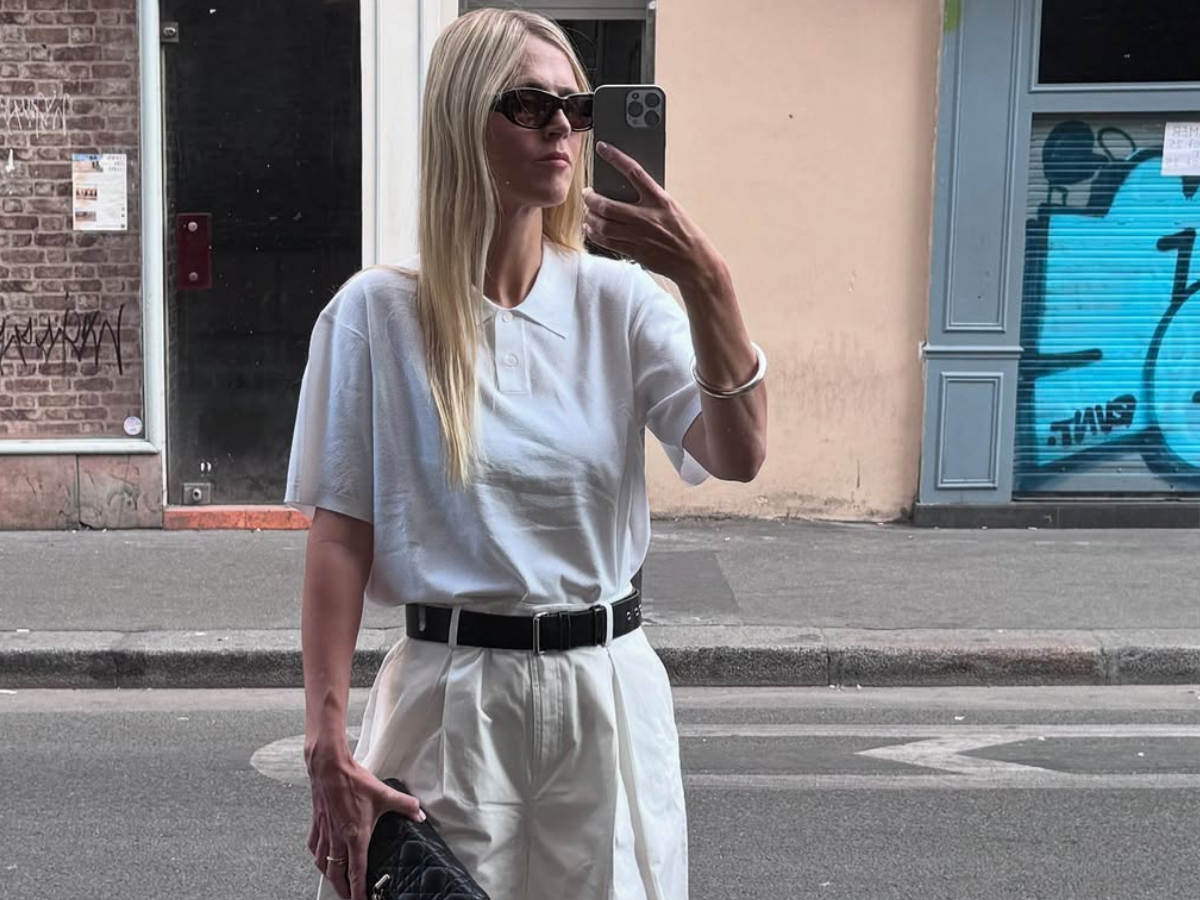 woman wearing white trousers black belt fall outfits 2025