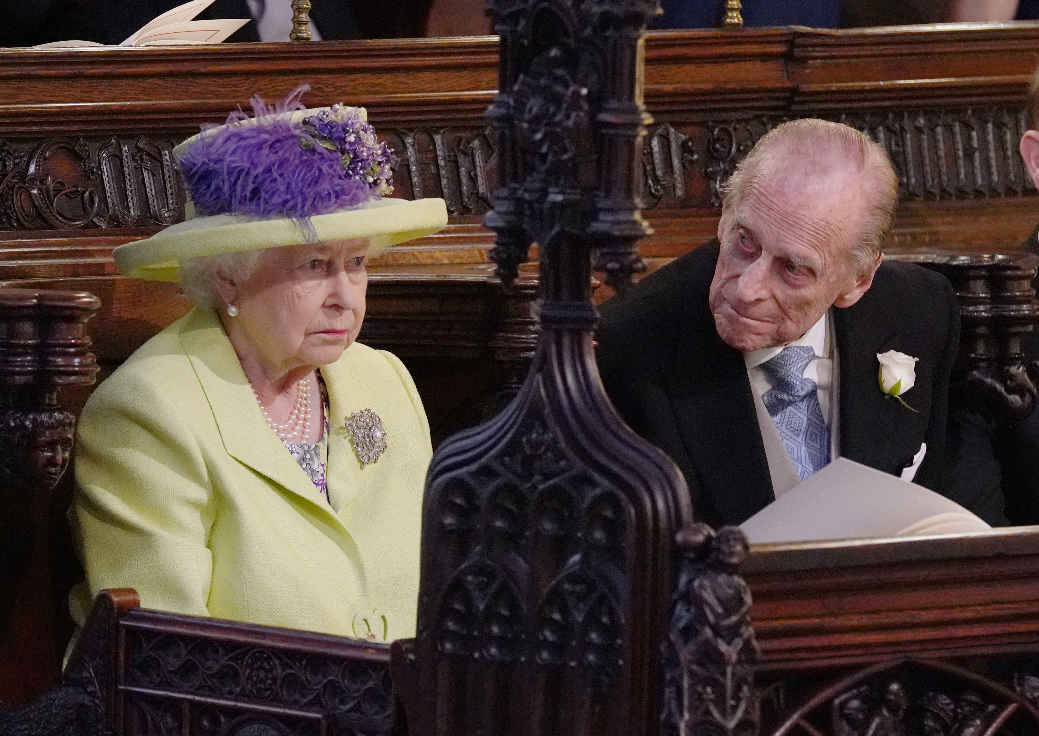Queen Elizabeth wears a lime green outfit to attend Prince Harry and Meghan Markle's royal wedding on May 19, 2018