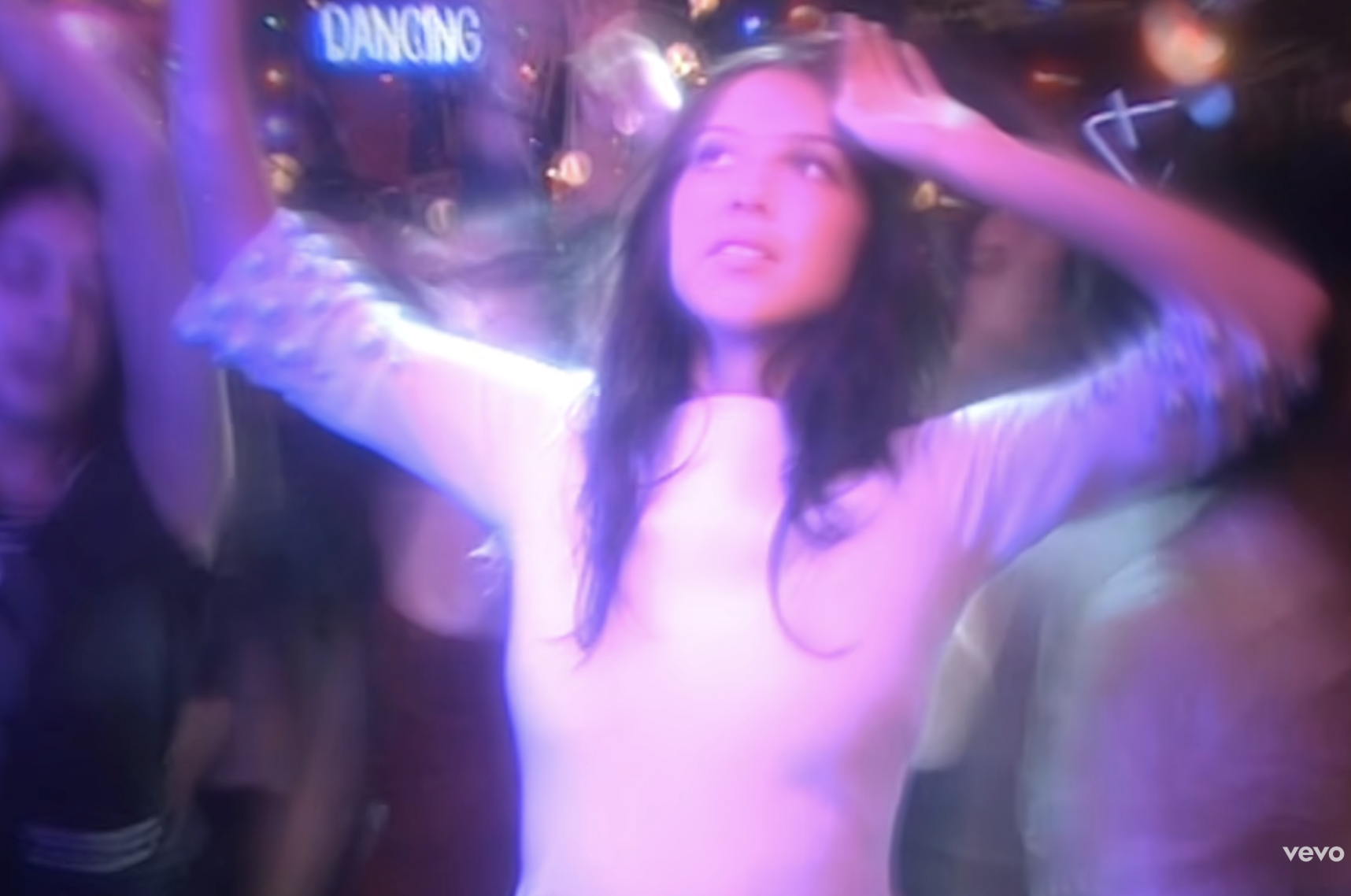 Olivia Rodrigo wears a vintage white dress in her "Drop Dead" music video, originally worn by Jane Birkin in 1975