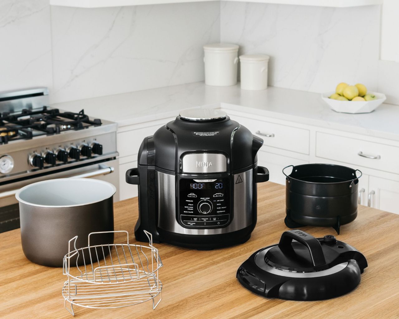 Ninja Foodi 9-in-1 multicooker in kitchen with accessories