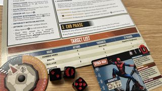 components from Marvel Zombies: Heroes' Resistance including an exp marker, hero sheets, and dice