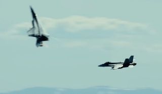 jets dogfighting in Top Gun Maverick